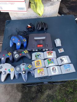 Total $515! Do the math. $180! 2 controls. 1 Game & red Graphics Card. Nintendo N 64 N64 . $30! Per Game. $25 memory $25 extra control im willing to t