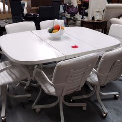 Nice White Table w/ Leaf and Six Rolling Chairs for sale 🍽️

