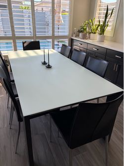 Frosted Glass Dining Table and 8 Black Chairs