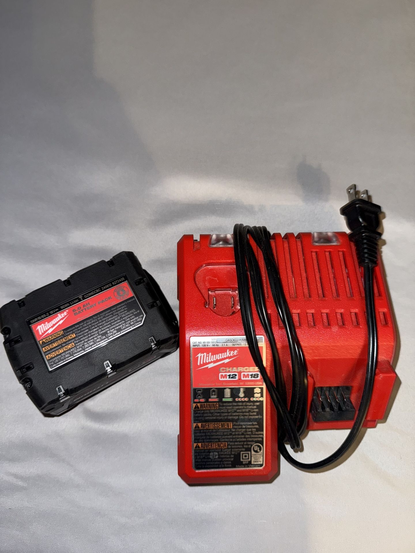 Milwaukee Battery And Charger