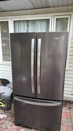 French door refrigerator freezer combo Black stainless steel Whirlpool