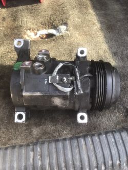 AC COMPRESSOR