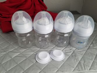 brand new avent bottles with extras