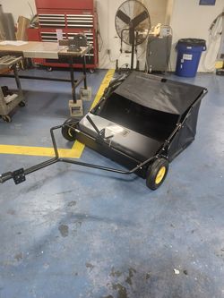 42" Brinly lawn sweeper with Dethatcher kit