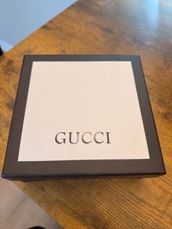 Gold Gucci belt