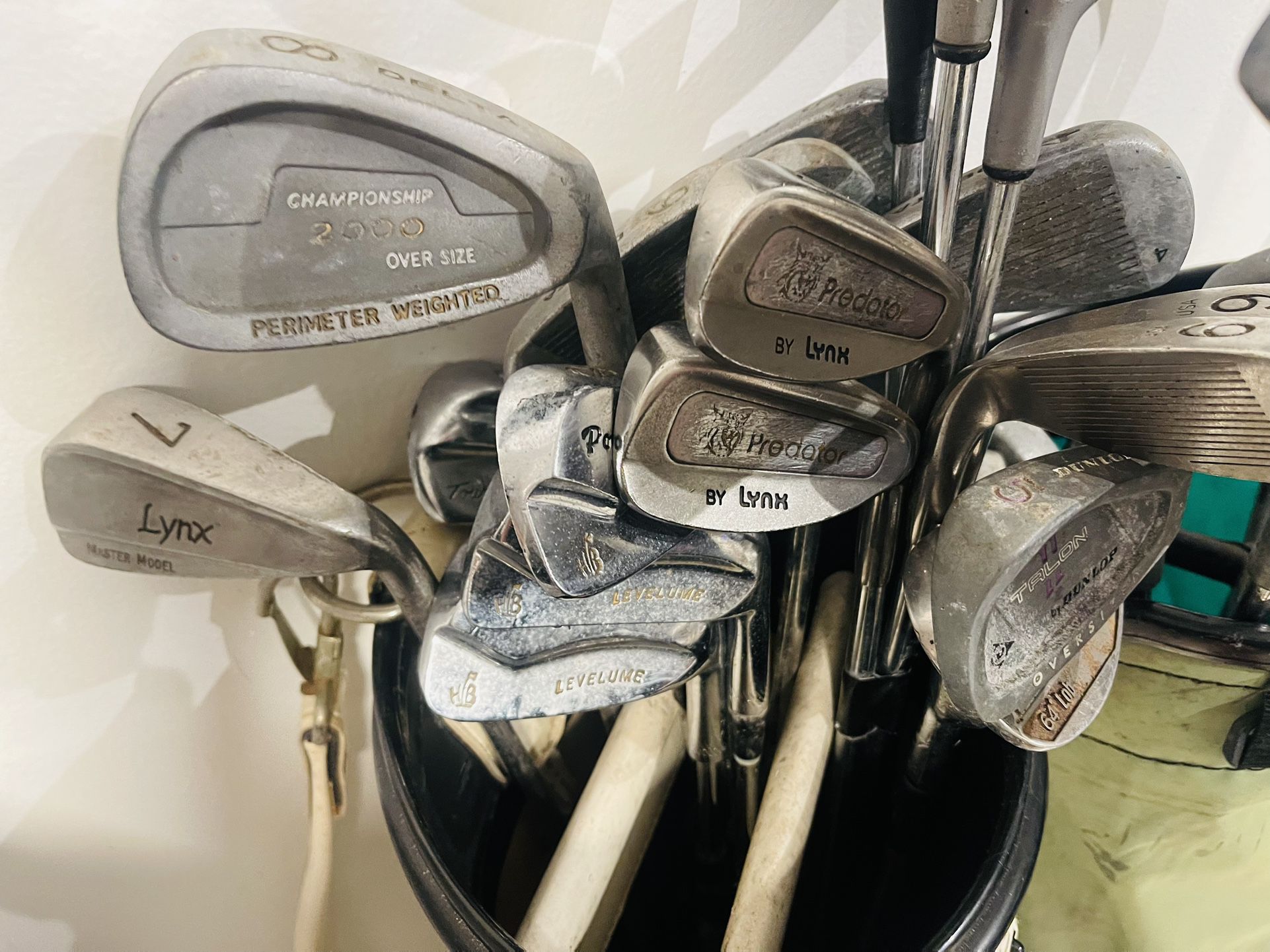 Assorted golf Clubs And 2 Bags 