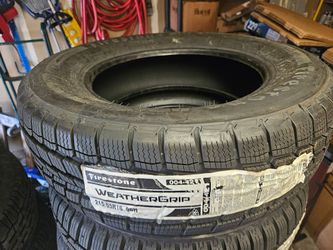 Firestone weather grip all weather touring Tire 215/65R16 98H