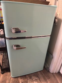 Teal mini fridge