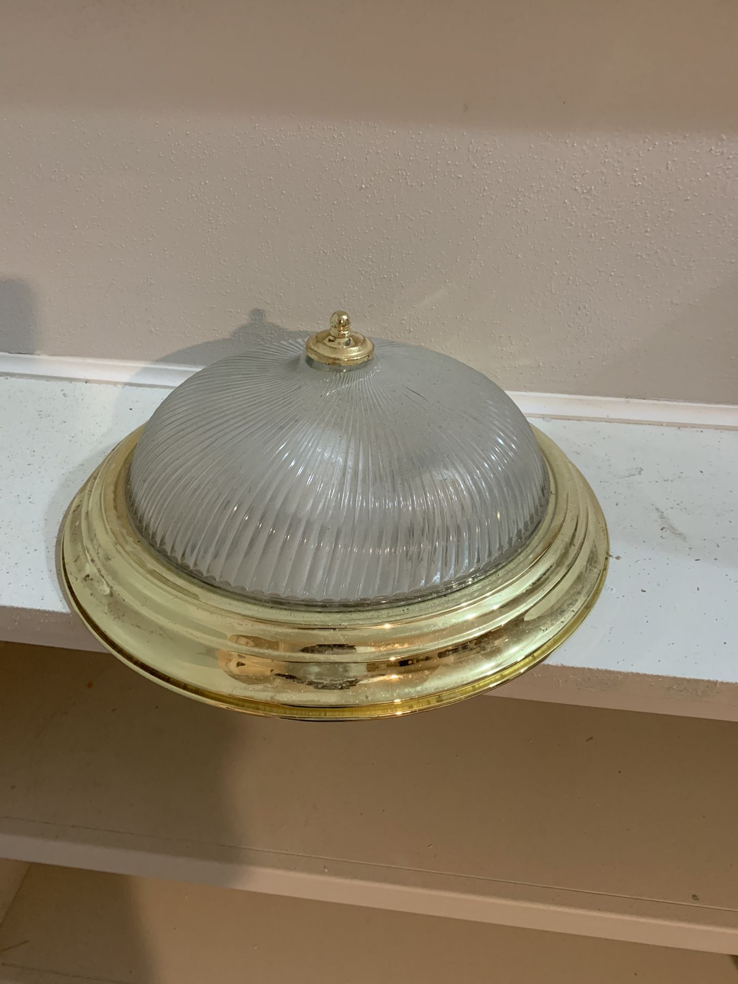 Used gold light fixture