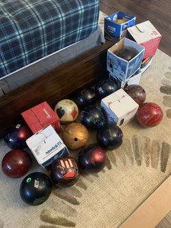 Bowling balls, new and used, contact for prices