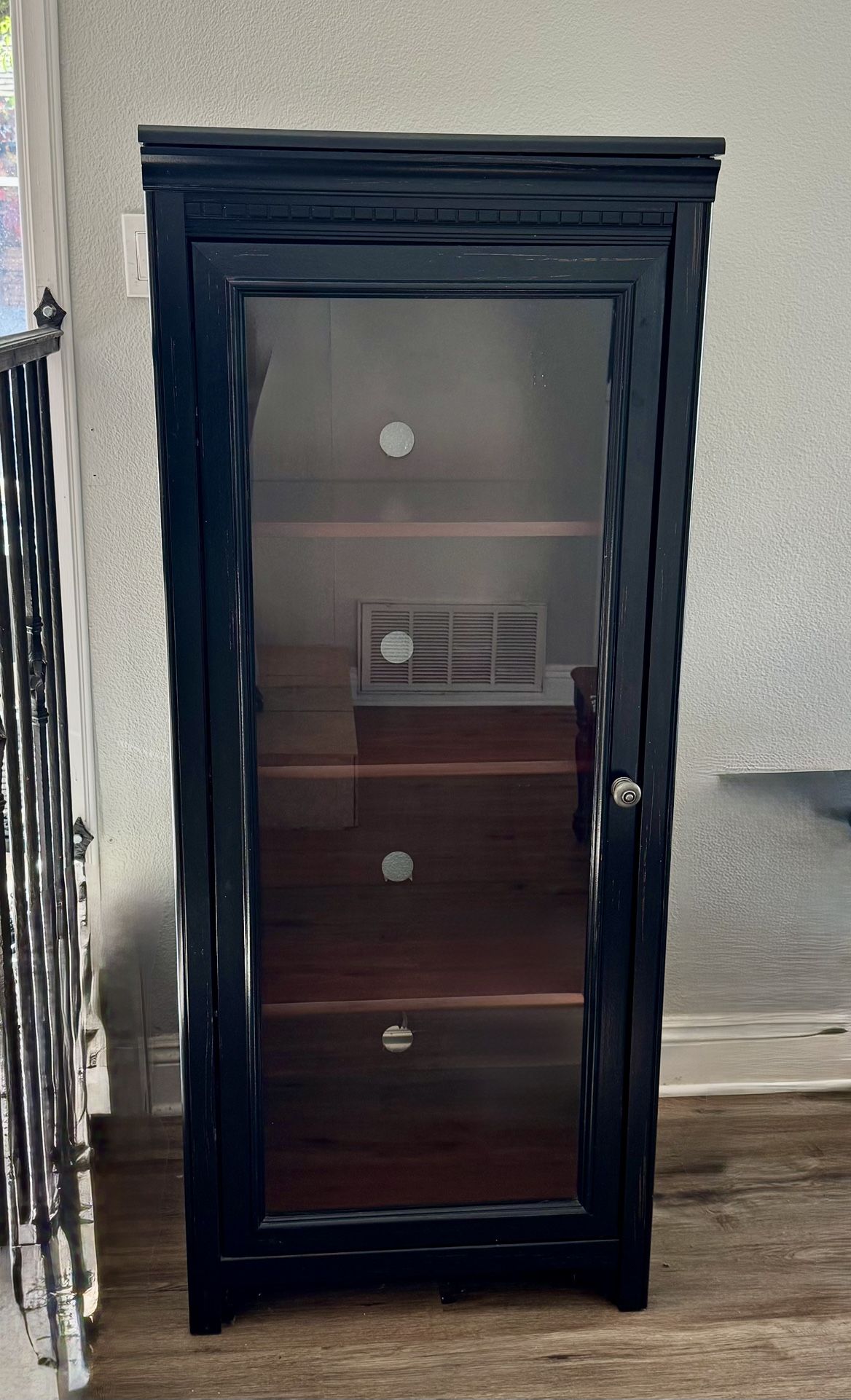 Bush Stanford Audio Cabinet with glass door in an antique black finish