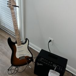 Fender squire stratocaster with Fender mustang LT25 amo