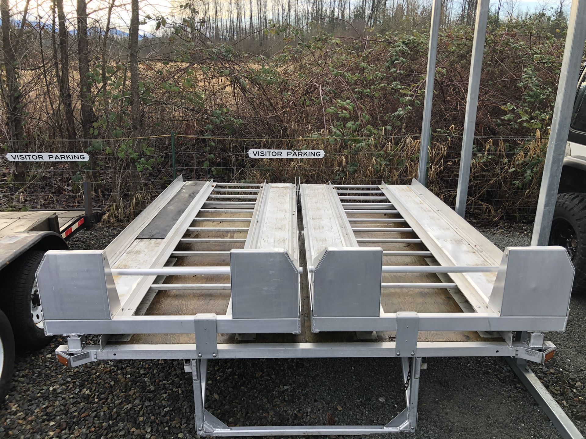 Hi-lite aluminum sled deck. This is the safest sled deck made. Load the sleds individually on the ramp then easily lift up the ramp by hand.