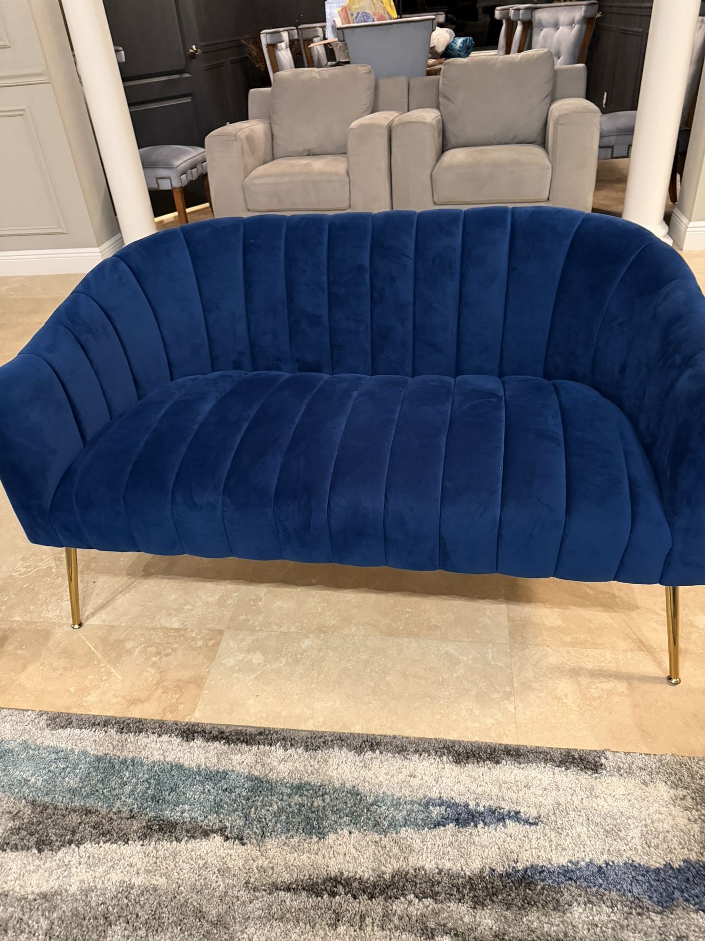 Gorgeous blue velvet loveseat.