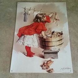 Vintage Metal Sign Little Girl Hanging Up Her Washed Toys