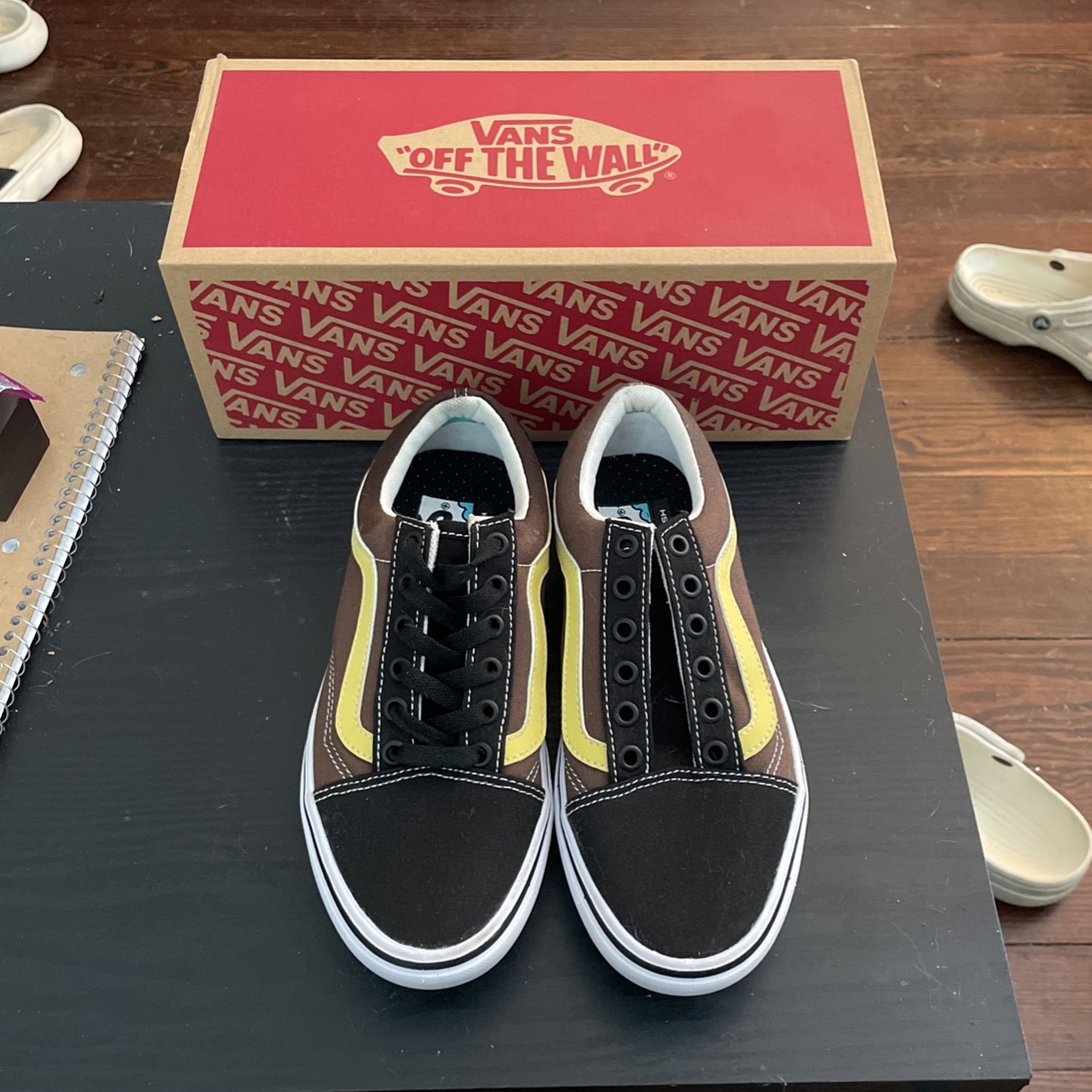 Brown/black Vans 