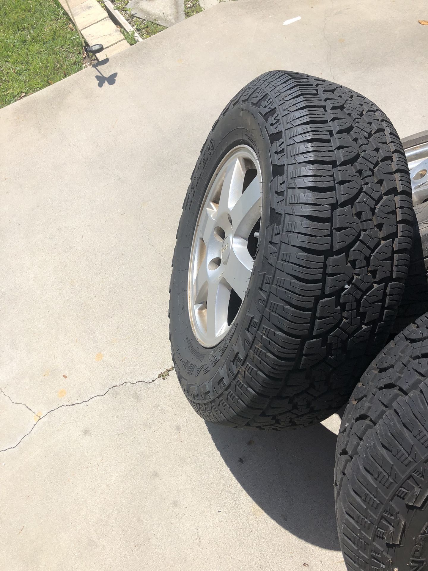 2 Almost New 265x70x17 All Terrain Tires Off Jeep Grand Cherokee With Rims