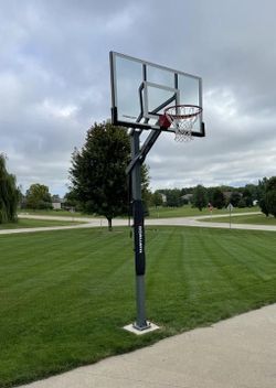 Goaliath 54 inch in ground basketball hoop, adjustable basketball court