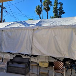 Large cover canopy, motorhome, or storage mobile garage.Tarp