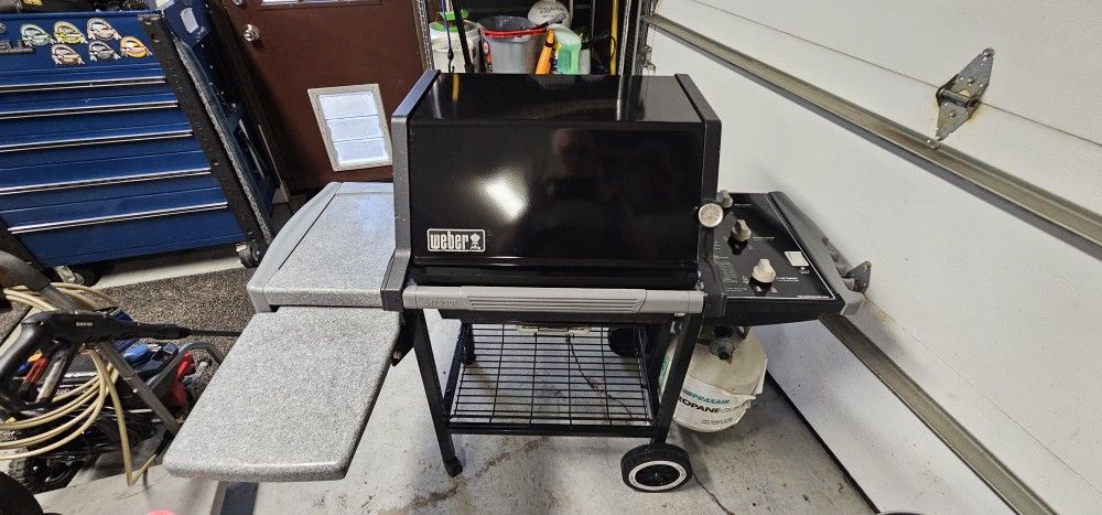 Refurbished Weber 3 Burner Propane Grill.