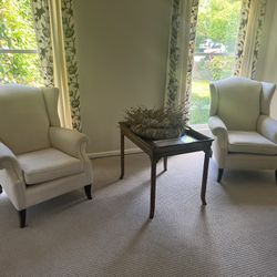 Two Upholstered Queen Anne wingback Chairs