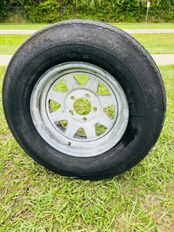 Carlisle USA Trail Tire and Wheel galvanized 215/75R14