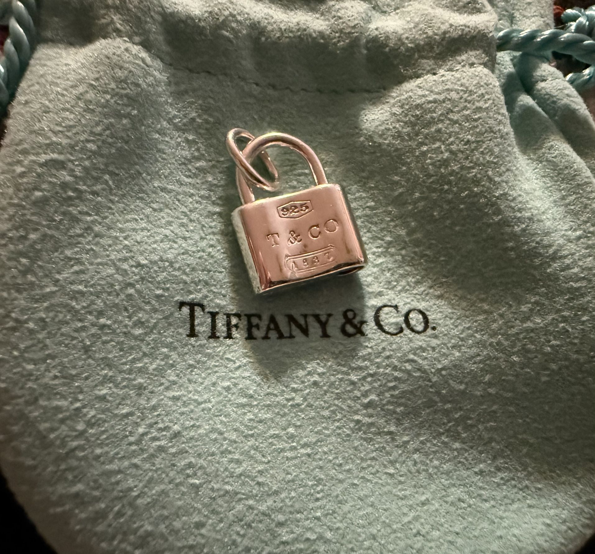 Tiffany & Co. Sterling Silver Padlock Charm — Retired - early 2000s