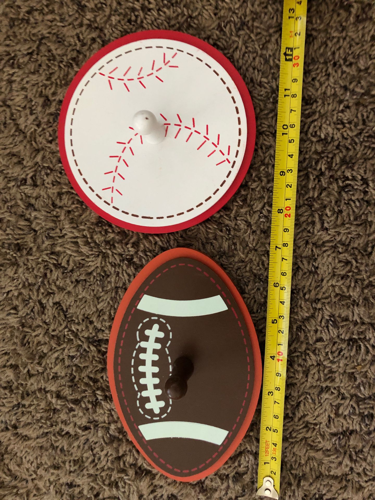 Sports themed: one football and one baseball Coat rack/backpack hangers.