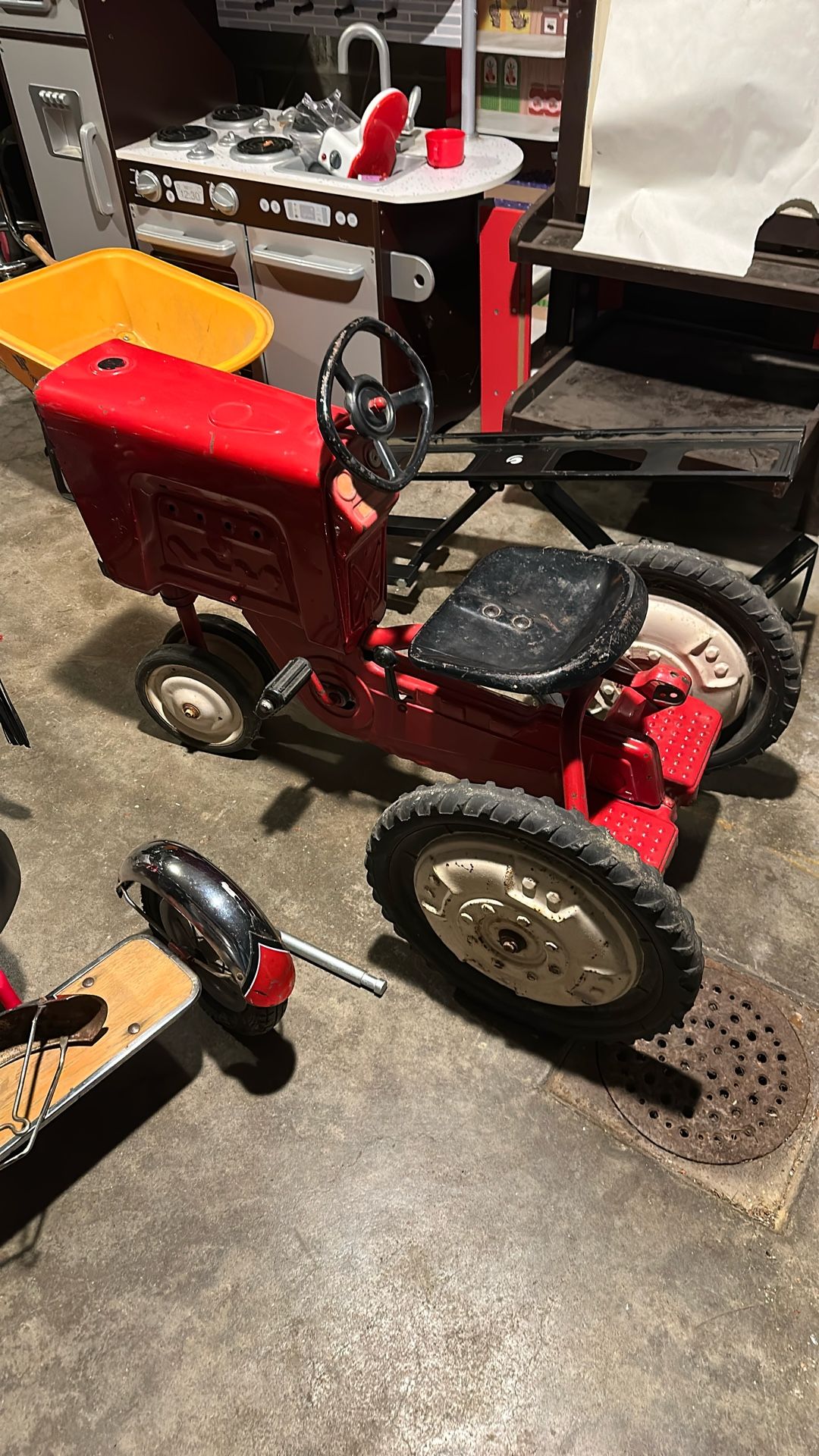 Antique pedal tractor