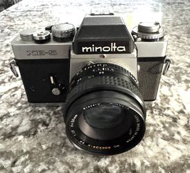 Minolta XE-5 35mm SLR film camera.