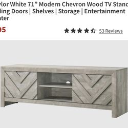 Modern entertainment center in excellent condition, only 2 months old.