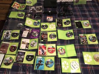 xbox 360(with connect) and 25 games (working)and 2 controllers