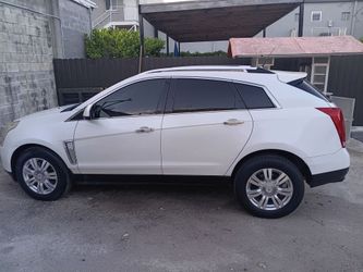 Cadillac modelo srx 4 año 2013 color blanco