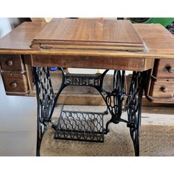 Singer Sewing Machine. Machine and Sewing Table Together! Machine Not Tested. Table is a Beauty