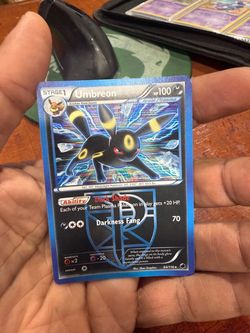 Umbreon (64/116) card from the 2013 Pokémon TCG Black & White: Plasma Freeze set.