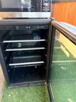 Microwave and wine fridge