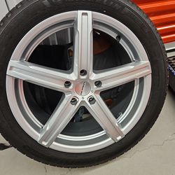 Brand new Tesla model 3 rim plus great used tire Michelin Defender  2