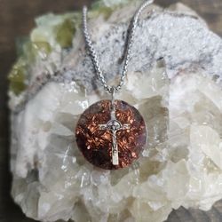 Amara Round Orgonite Pendant – Amethyst, Silver Crucifix, Stainless Steel Chain


The Amara pendant is a round orgonite piece made with amethyst, a si