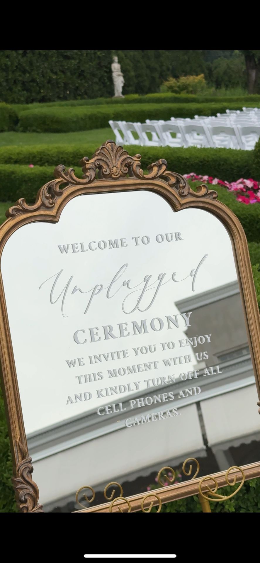 Unplugged ceremony sign with gold easel