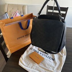 Louis Vuitton Shoulder Bag.   