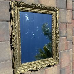 ANTIQUE MIRROR OUTSIDE DIMENSIONS  33 INCHES X  26.5 INCHES