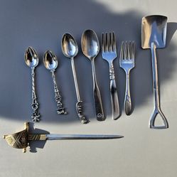 vintage Italian silver-plated cocktail utensils and a decorative sword Letter Opener