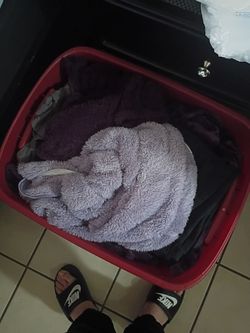 Bin full of clothes