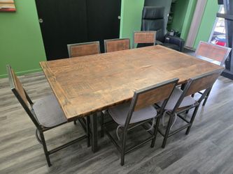 Table and chairs by Urban Reclamations