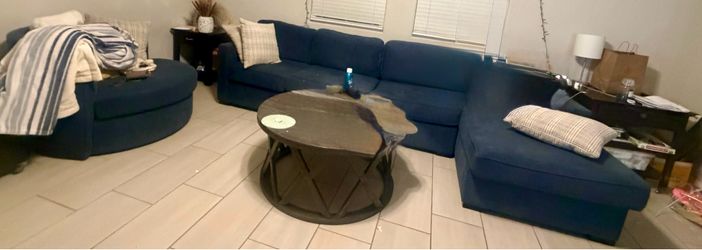 MOVE OUT SALE: Living Spaces Sectional & Swivel Cuddle Chair Set
