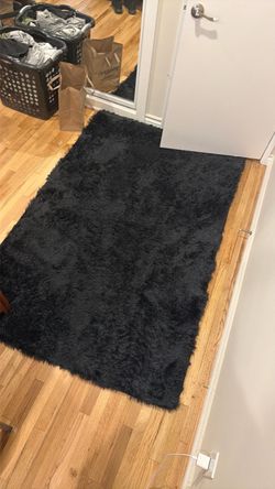 Black plush rug