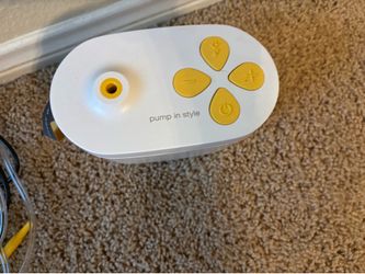 Pump in style breast pump
