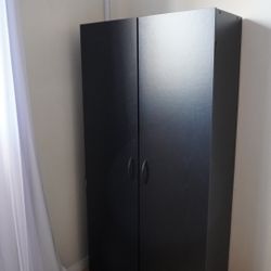 Black two-door book shelf or dresser