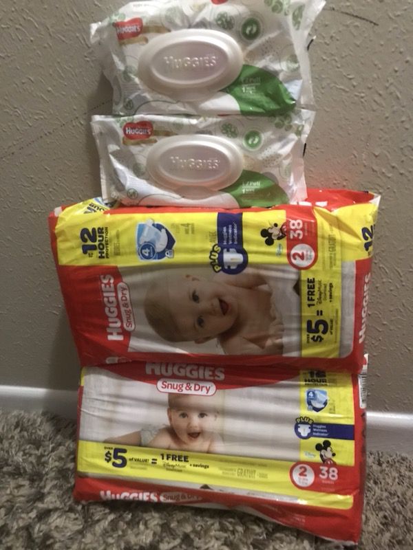 Huggies diapers snug and dry size 2 with 2 packs of wipes