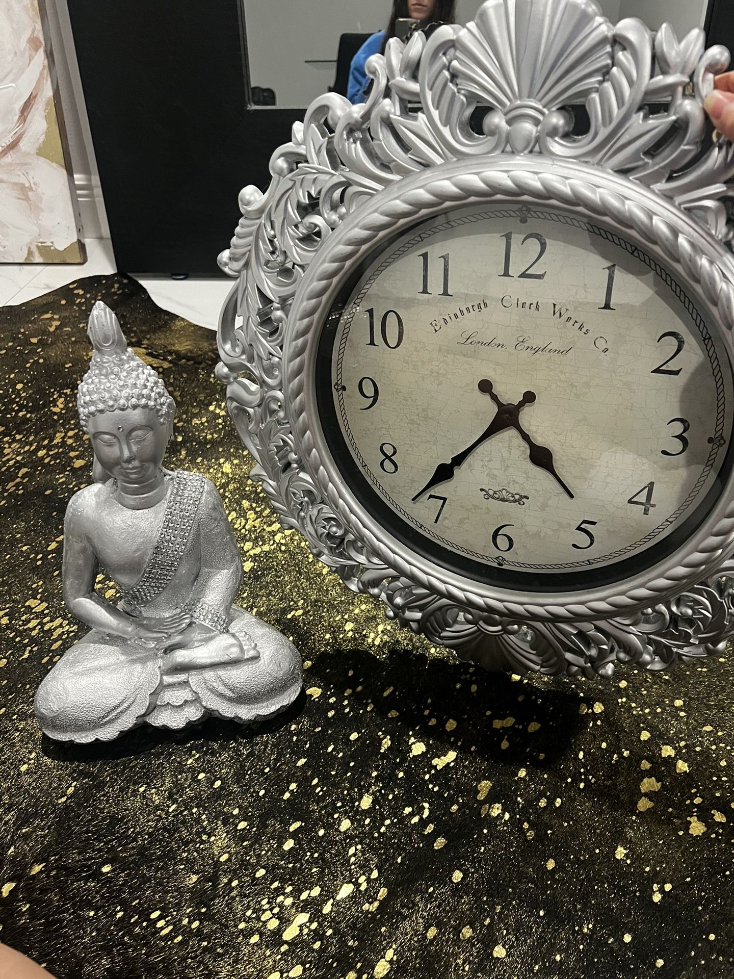 Buddha Statue And Clock